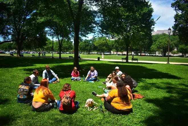 Students sitting in a circle 