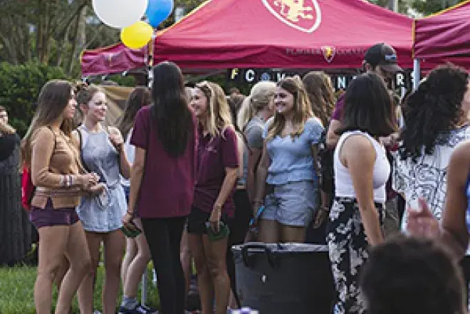 Students gather on the West Lawn for Club Night. 