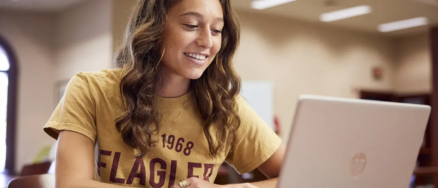 Student working on her computer