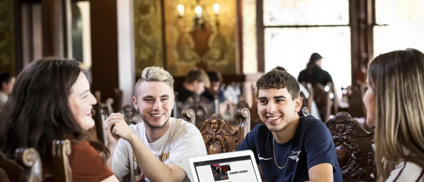 Flagler College students enjoy a meal in the Dining Hall.