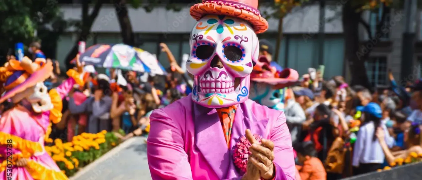 A person dressed up for Dia de Los Muertos