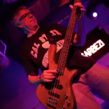 Yvan Kelly playing guitar