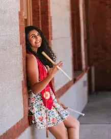Maddie Torres with Drumsticks