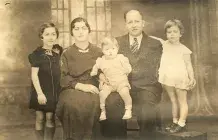 An old, sepia-toned family photo