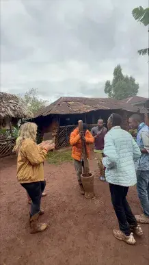 Nateleigh Nachreiner grinding coffee