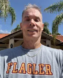 Heashot of tennis head coach Jonas Piibor