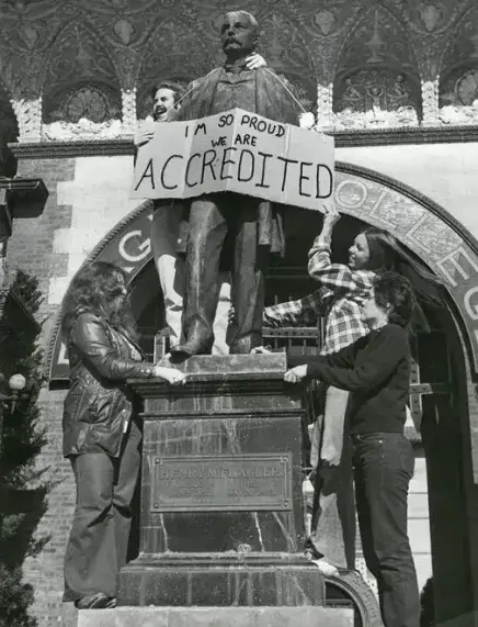 Students celebrating the College's 1973 accreditation