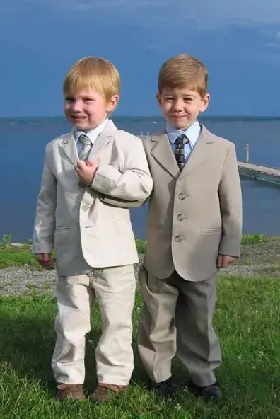 Jacob and Noah dressed in suits when they were much younger.