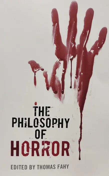 Poster with a bloody hand and the title "The Philosophy of Horror" underneath it.