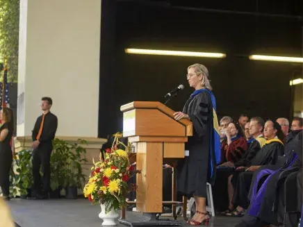 Paula Seymour at Commencement podium