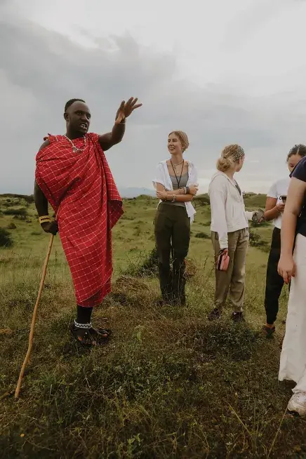 Students talking to locals in Tanzania