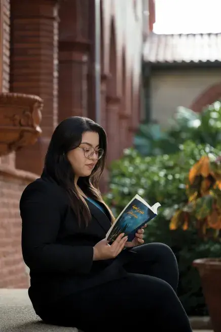 Sana Mohtasebzada reading her book