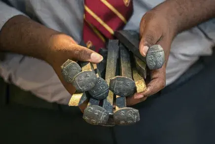 Handful of Convocation railroad spikes