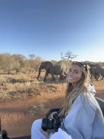 Olivia Lockett with Elephants