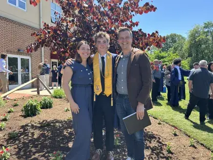 Lucca Tomassoni and parents