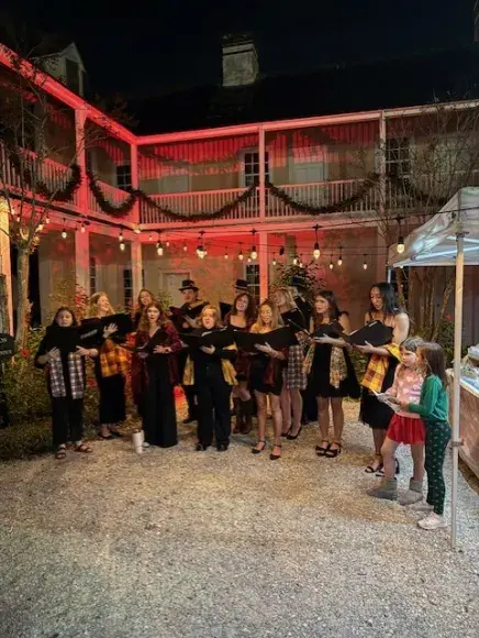 Holiday Caroling at the XF House