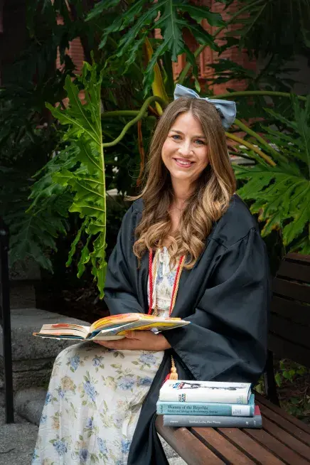 Rachel Lynne Wall pictured reading a history book