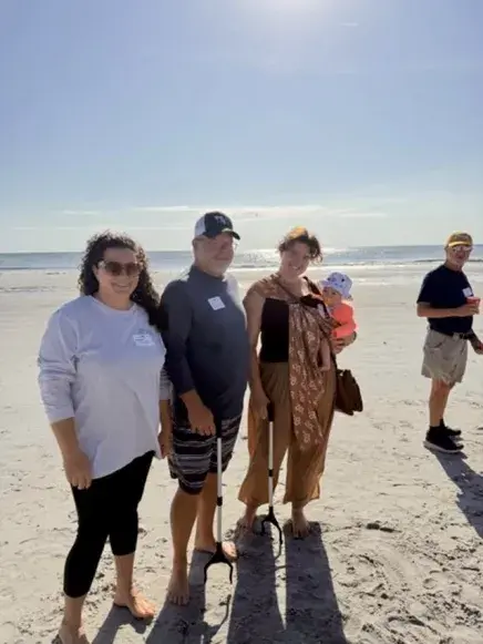 The Moorman family at the beack clean up event