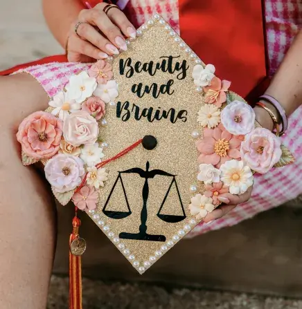 A photo of Brigitte Traill's grad cap design