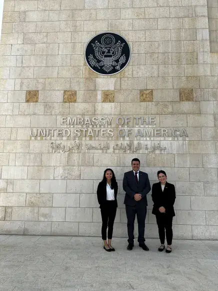 Alum Matt Pierce outside the US Embassy somewhere in the middle east.