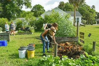 Carrie Grant and student at Lincolnville Gift Garden