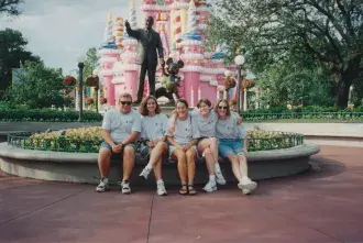 1997 Disney Trip | Students with "birthday cake castle" behind