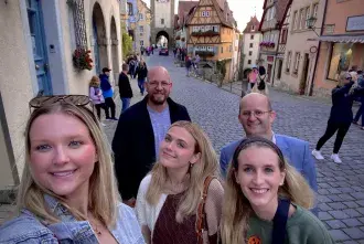 Three female students in Wurzburg Germany with two males