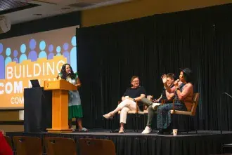 WIFT Com Week panel, wide-shot
