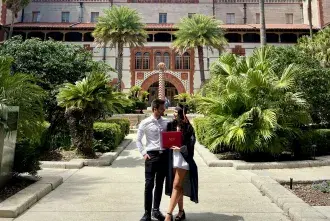 Shylowe Sortman and Florian Langer stare at eachother lovingly outside of the Ponce