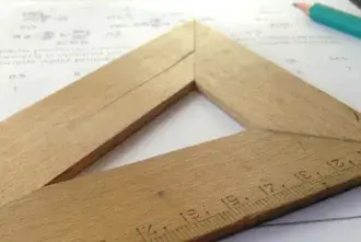 Ruler sits on top of math homework