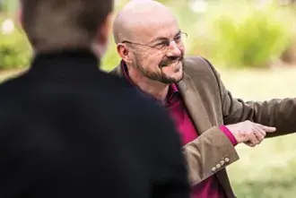 Professor Doug Keaton teaching students on the West Lawn