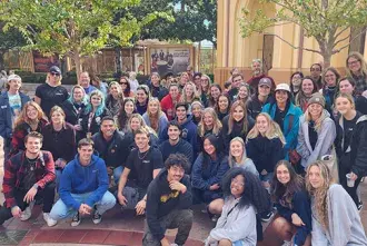 HTM students posing for group photo at Universal