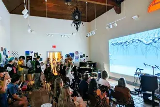 Crowd watching projected video in CEAM during FMFF 