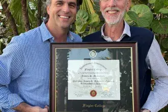 Ben Platt and Professor Jim Makowski holding certificate for scholarship