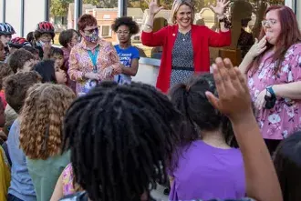 Marissa Harrer signing to students