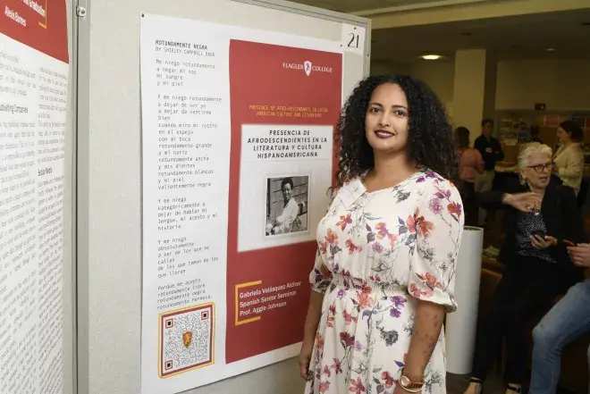 Student presenting research during honors day 
