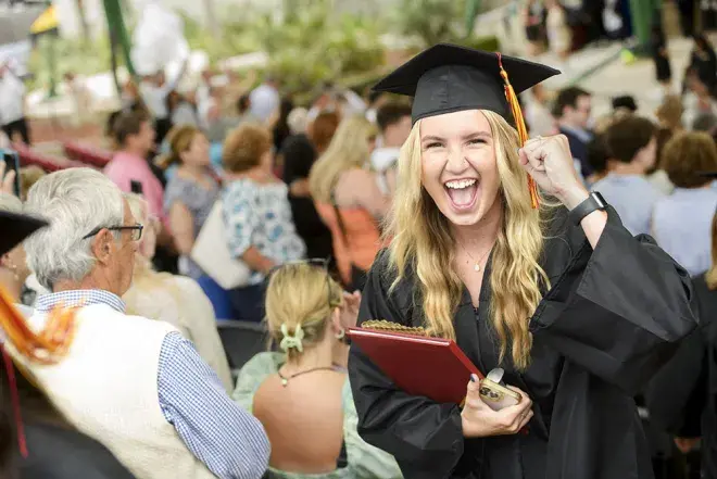 Student celebrating her graduation