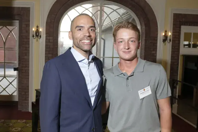 Student with community leader
