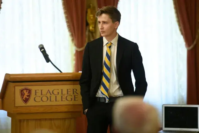 A Flagler College business student is shown.