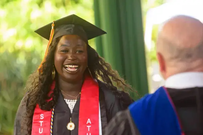 Flagler College grad Amuk Tong