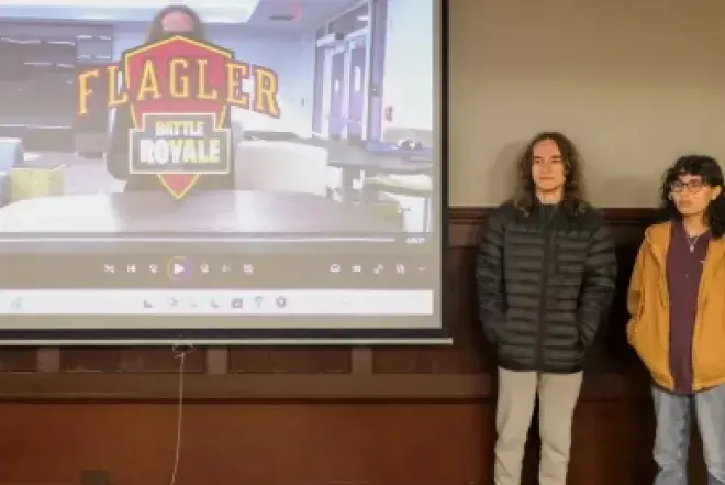 Students standing in front of screen presenting for FlagSHIP program