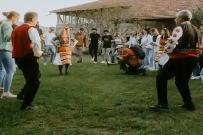 Image of students and faculty dancing