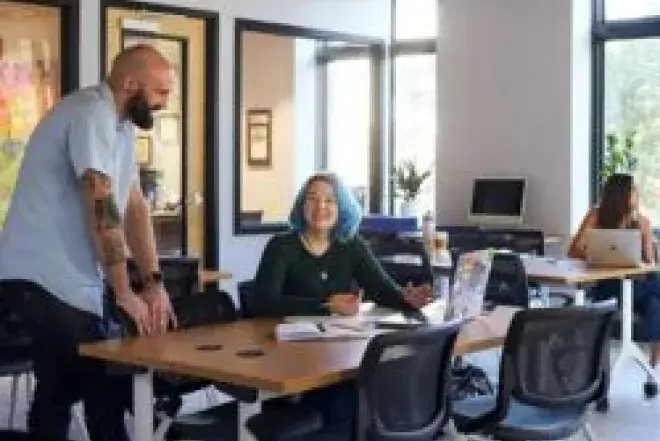 Professor talking to students