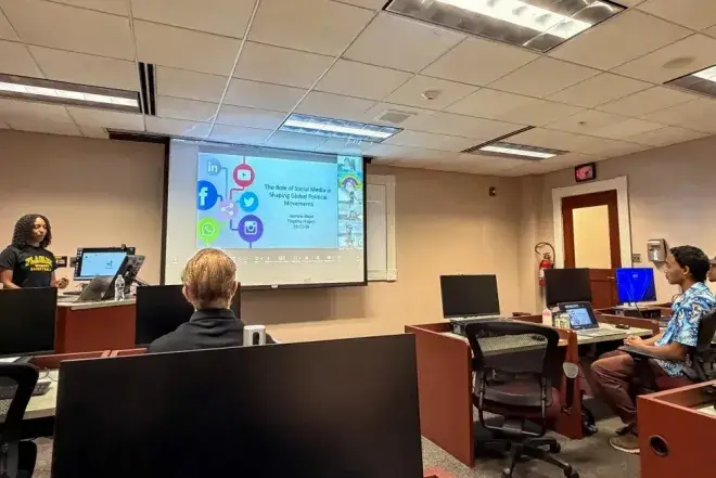 Professor teaching to students