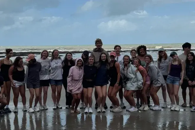 Students on beach in Australia