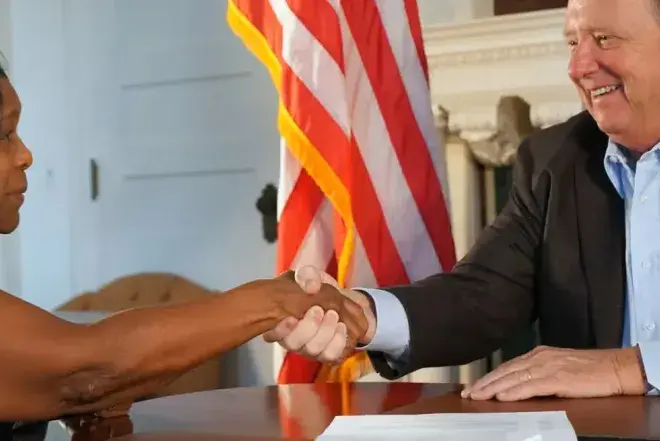 People shaking hands in agreement