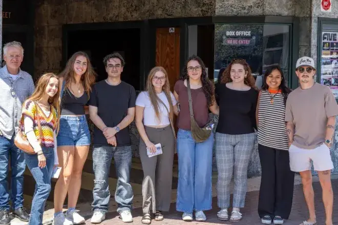 Graphic Design students in front of studio