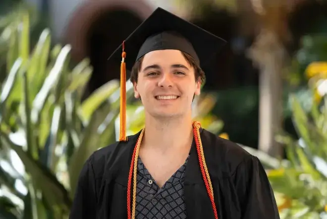 Student in cap and gown