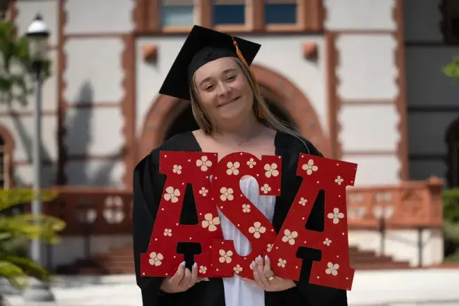 Student in cap and gown