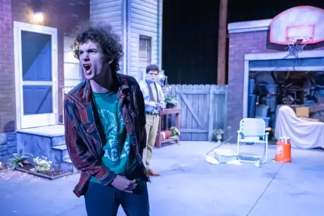 Student performing in stage play